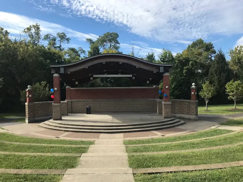 Brick amphitheater stage with lawn terraces in a Colerain Township park