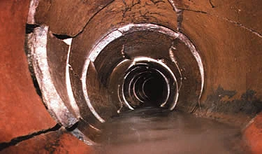 Sewer camera view of a cracked and separated clay sewer line