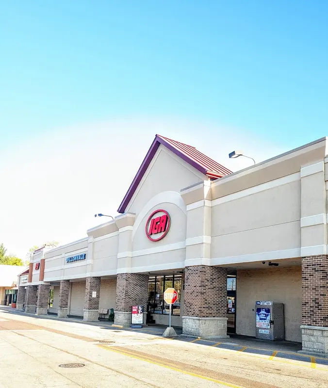 Dillonvale shopping center storefronts with the IGA store in Deer Park