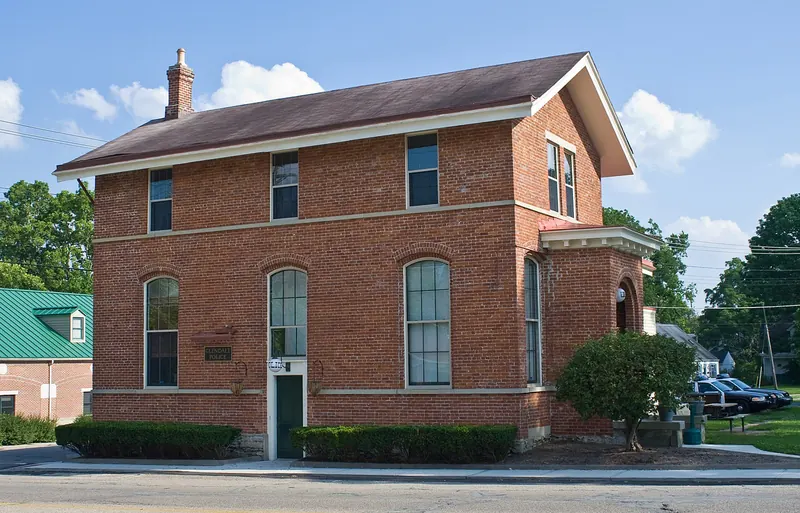 Historic red brick Glendale Police building on a sunny day