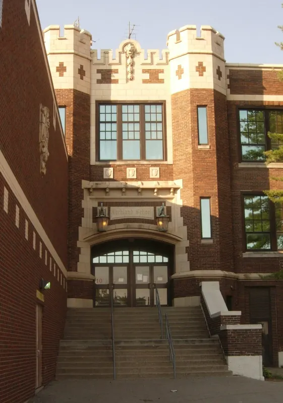 Lockland School entrance with stone steps and a castle-style brick facade