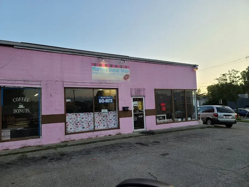 Pink storefront of Martin's Donut Shop in Trenton