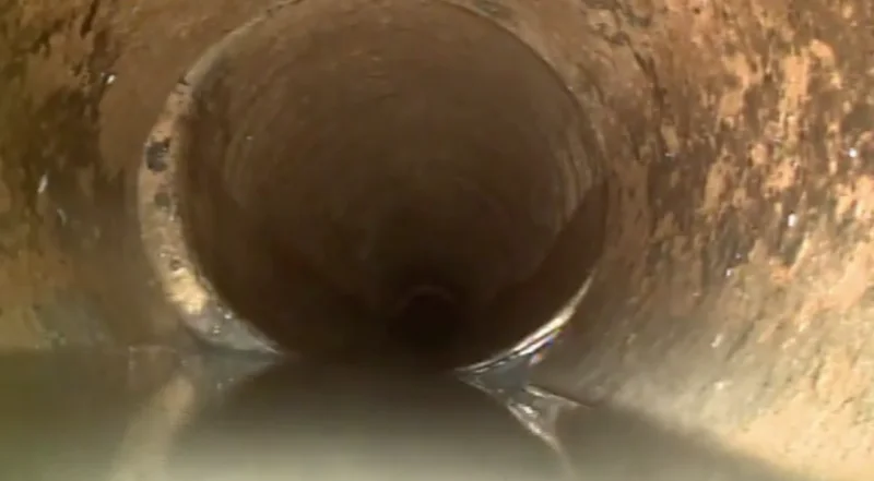 Sewer camera view looking down the inside of a drain line