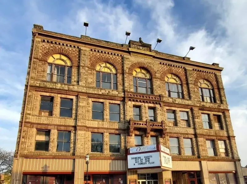 Stone facade and marquee of the Sorg Opera House in downtown Middletown