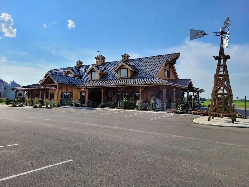 Timber-frame building with a windmill in Monroe